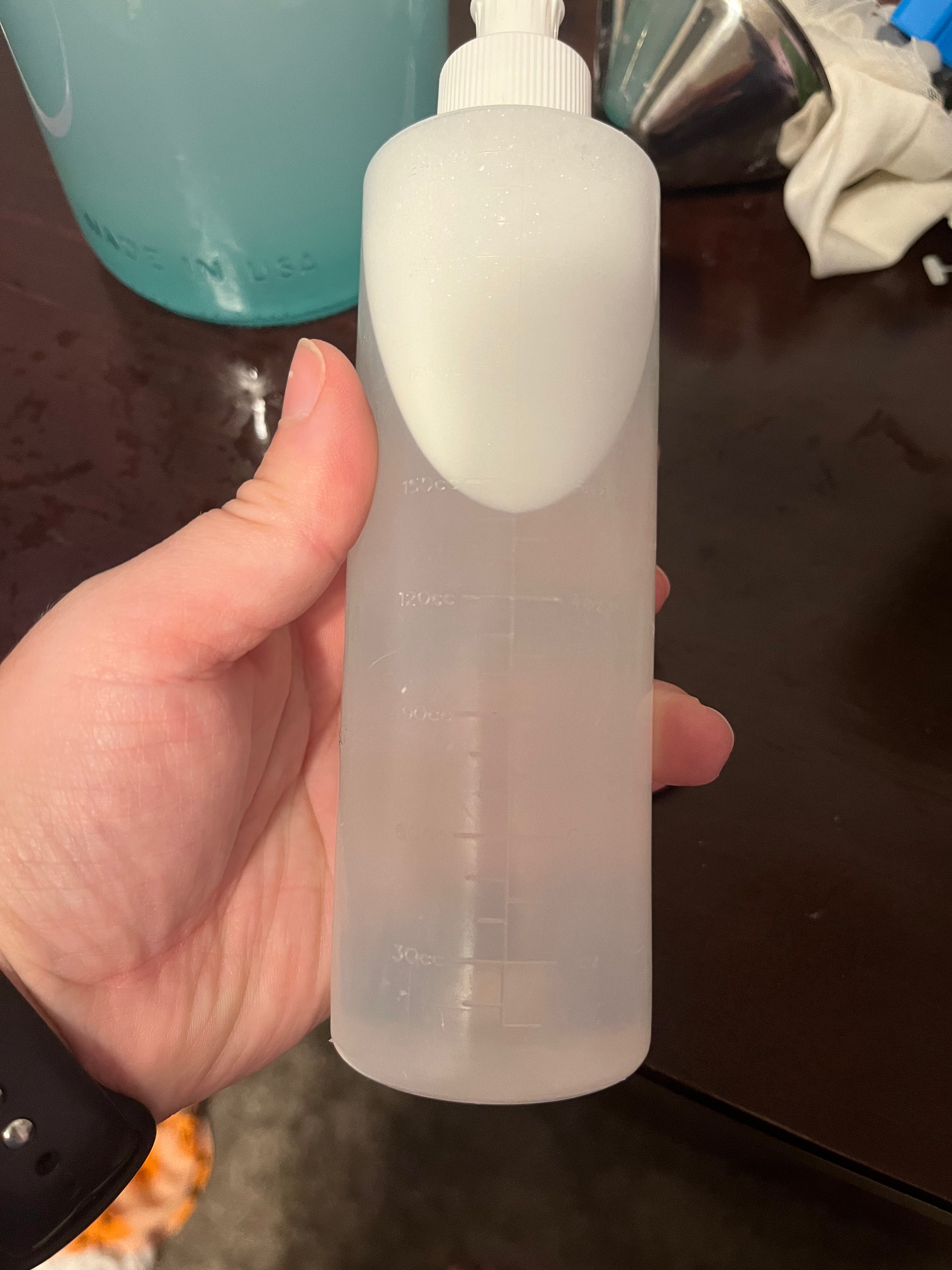 Wipe Bits Perri bottle used for wipe solution to easily squeeze onto cloth wipes.